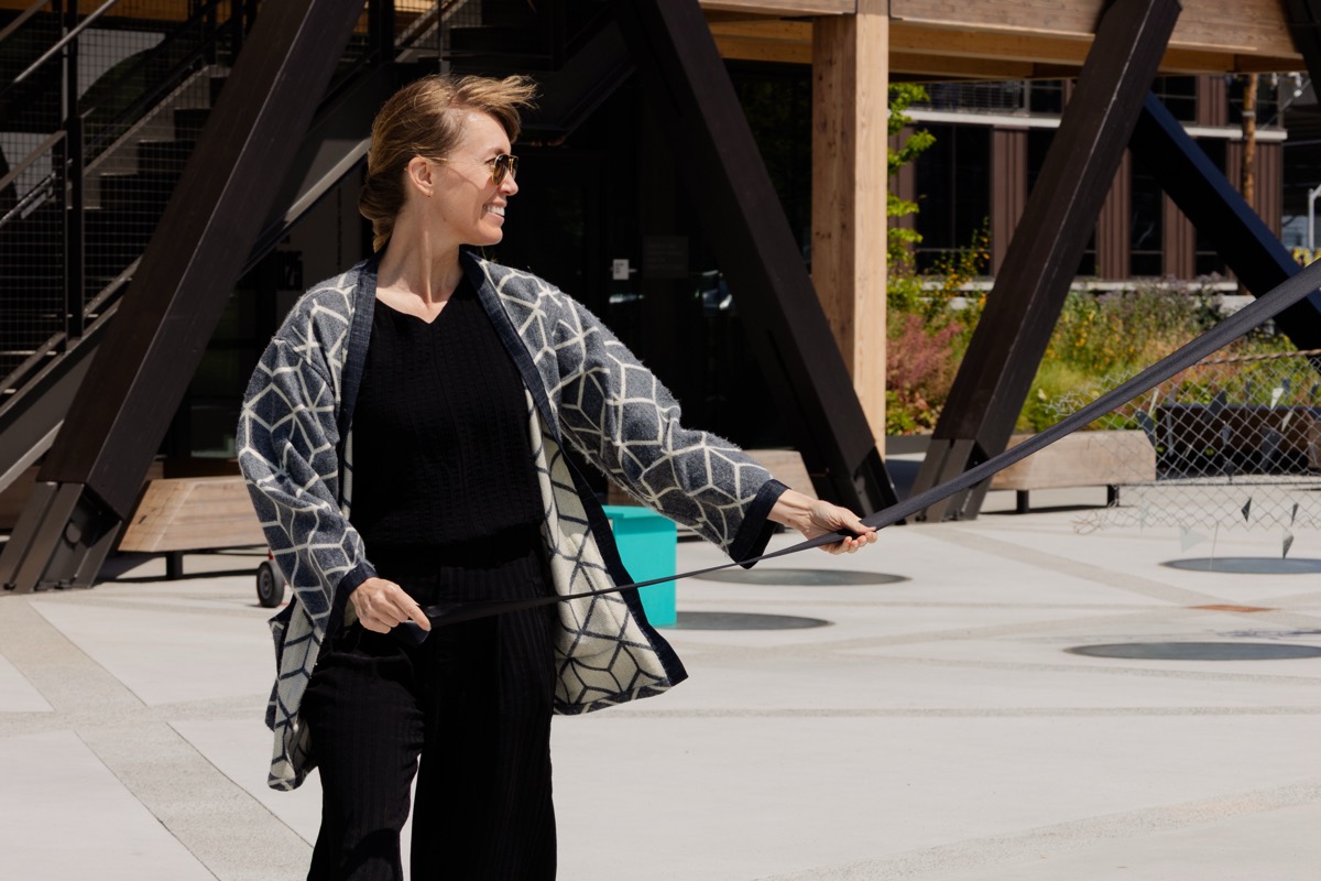 Guests engaging with work at Roots & Liberation